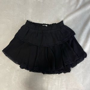 black mini ruffle skirt